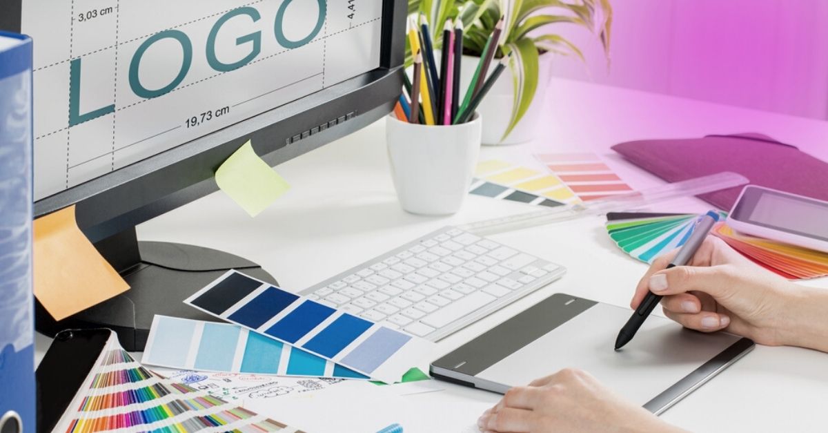 image of person looking at logo design and color swatches